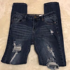VIP Distressed Skinny Jeans